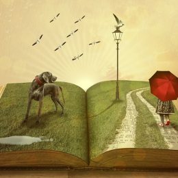 Offenes Buch mit Parklandschaft
